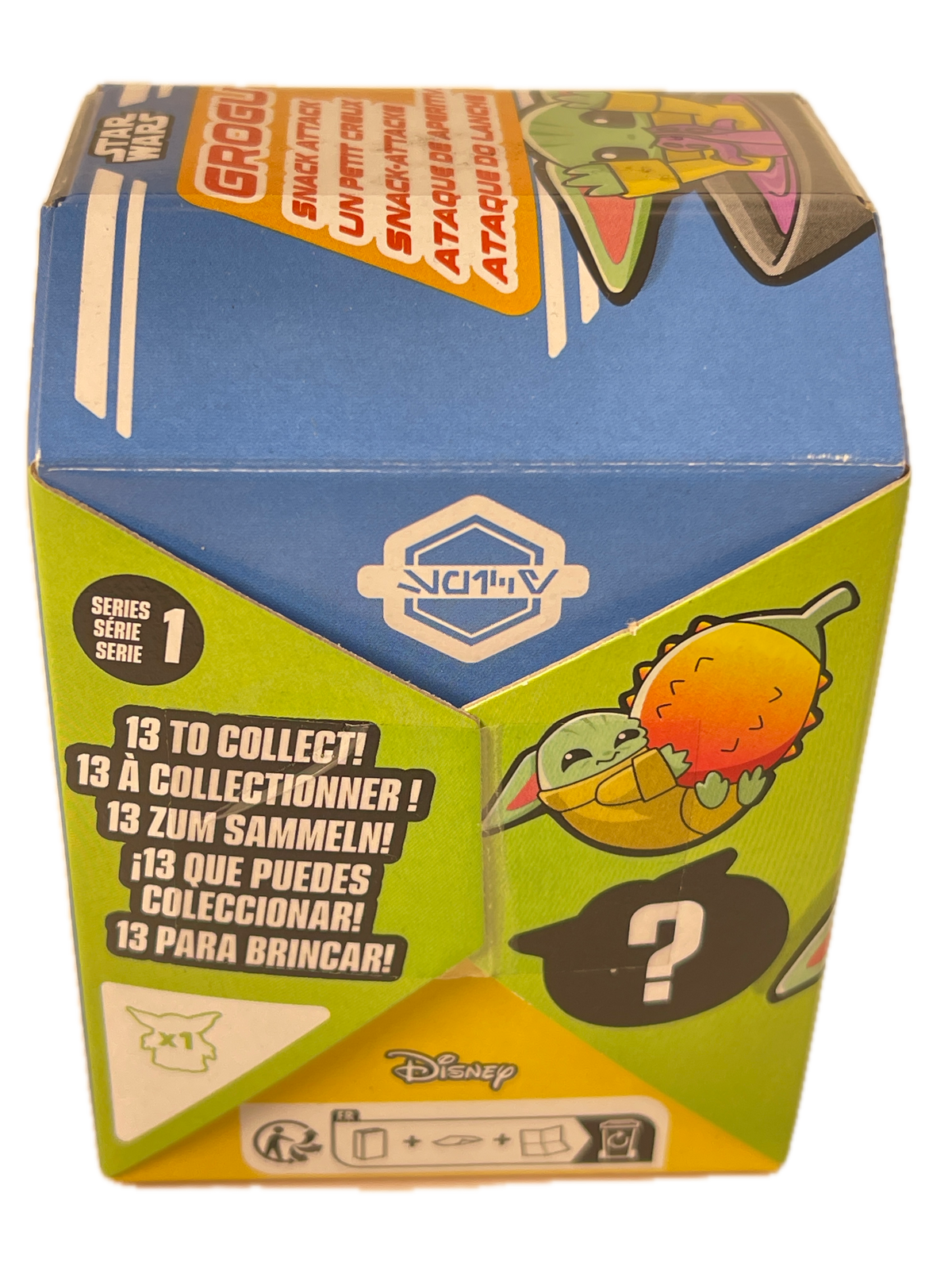 A collectible toy mystery box from Disney Attack on Titan, featuring a blue, green, and yellow color-blocked design with illustrations of a character and text indicating it contains 13 to collect. The Disney and Attack on Titan logos are visible.