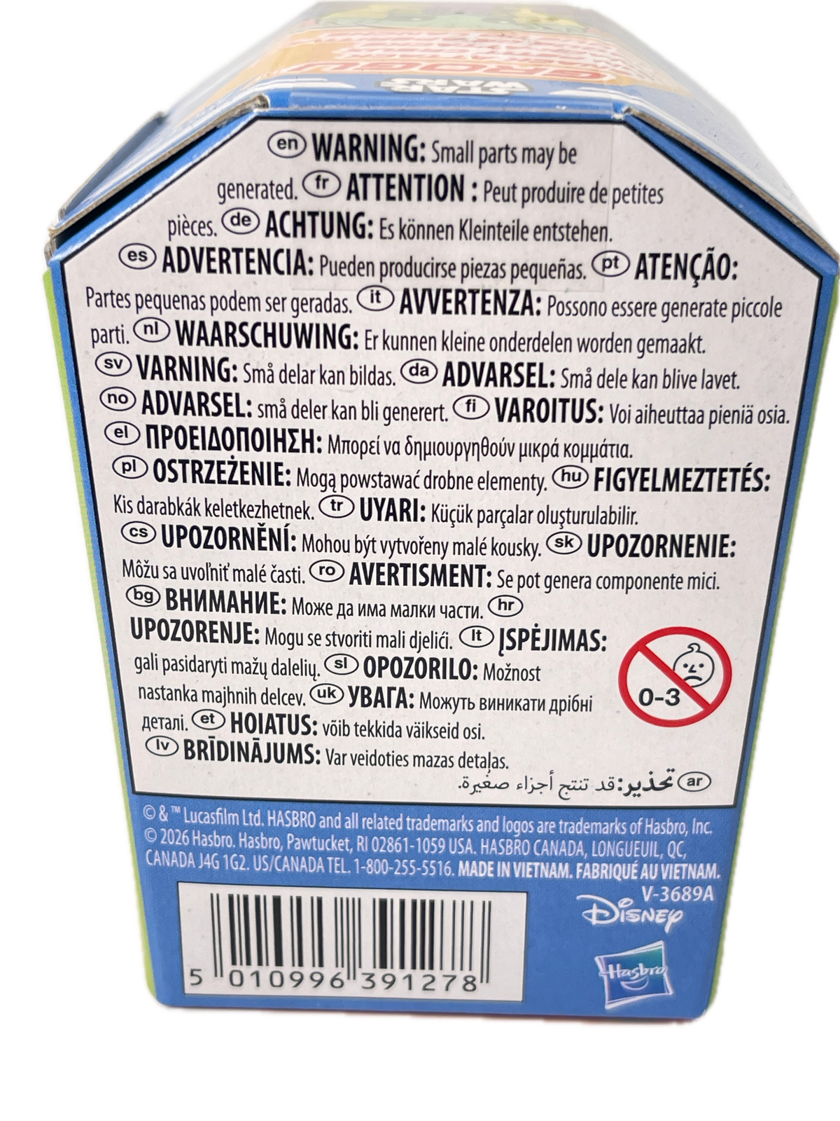 Close-up of the back of a Disney-branded product box with multilingual warning labels, a barcode, and a blue header panel.