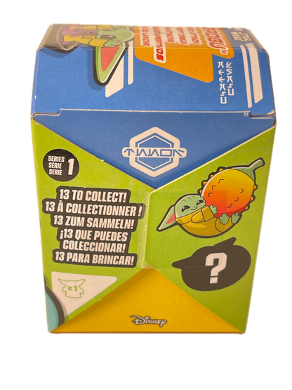 A colorful Disney Mystery Minis collectible box, showing the blue, green, and yellow sides with cartoon graphics and text indicating it contains 13 to collect.