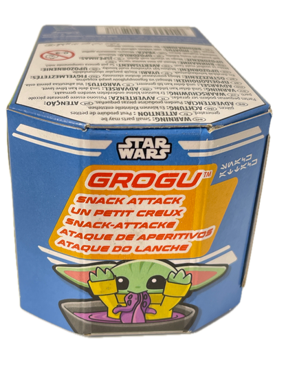 Star Wars Grogu snack attack box packaging, featuring a blue and yellow design with a cartoon illustration of Grogu and French text.