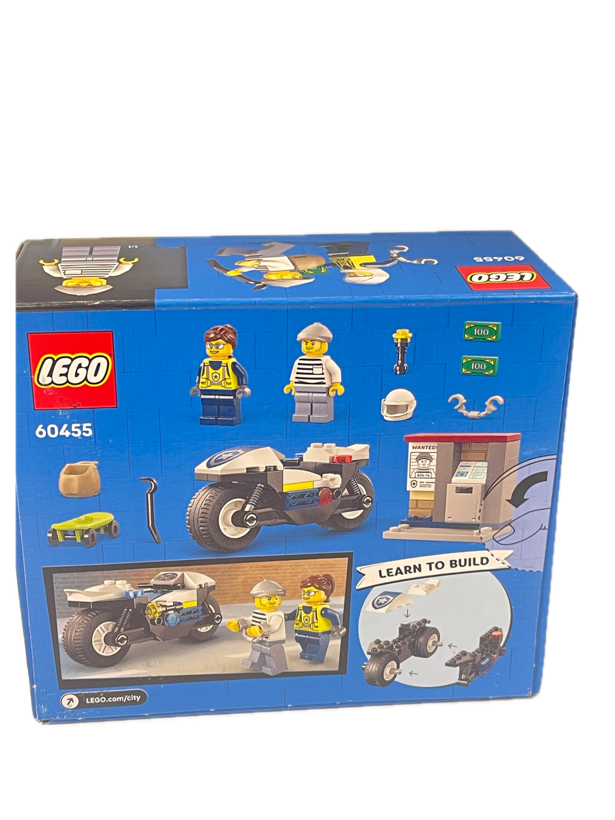 LEGO City Police Station set 60455 toy building box shown at an angle on a white background, featuring blue packaging with illustrations of minifigures, a motorcycle, and building scenes.