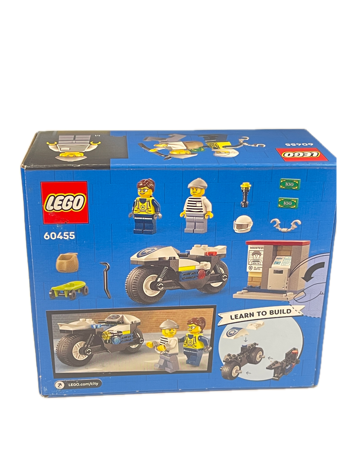 A blue LEGO box for set 60455, featuring illustrations of a workshop, mini-drover minifigures, a motorcycle, and tools on a white background.
