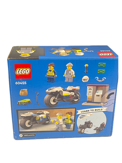 A blue LEGO box for set 60455, featuring illustrations of a workshop, mini-drover minifigures, a motorcycle, and tools on a white background.