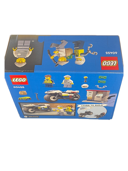 LEGO City Camper Minifigure set box, number 60455, featuring a blue packaging design with illustrations of the camper, minifigures, and accessories.