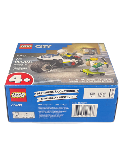 LEGO City police motorcycle building set box, showing the blue packaging with a photo of the assembled toy motorcycle on the front and product details on the side.