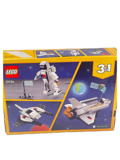 LEGO 3-in-1 Space Explorer set box, model 31126, featuring illustrations of a white space shuttle, astronaut, and space station on a yellow and blue packaging design.