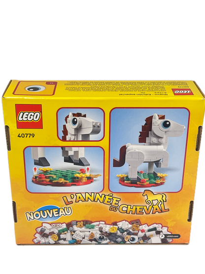 LEGO 40379 L'Année du Cheval box set, featuring a bright yellow packaging design with illustrations of a white and brown horse built from LEGO bricks.