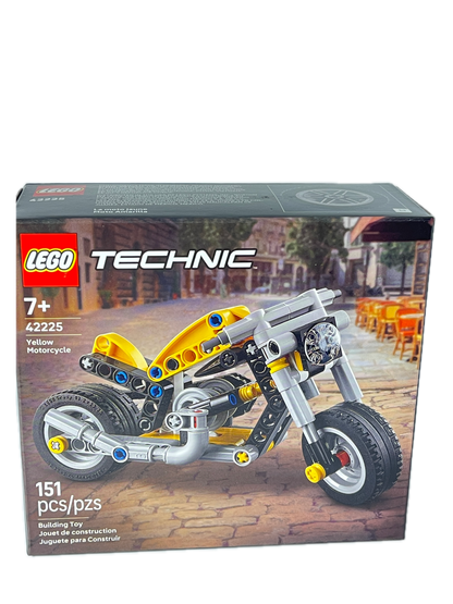 LEGO Technic Motorcycle building set box, number 42225, featuring a yellow and silver mechanical motorcycle on a white background.