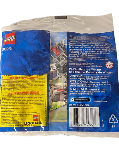 The back of a LEGO 30251 building set bag, showing the product code, barcode, warning labels, and a glimpse of the mixed plastic building blocks inside through a clear window.