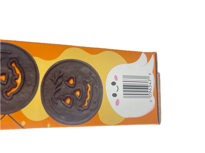 A close-up of a Halloween-themed snack box showing two jack-o'-lantern cookies on an orange and yellow background with a white ghost illustration.