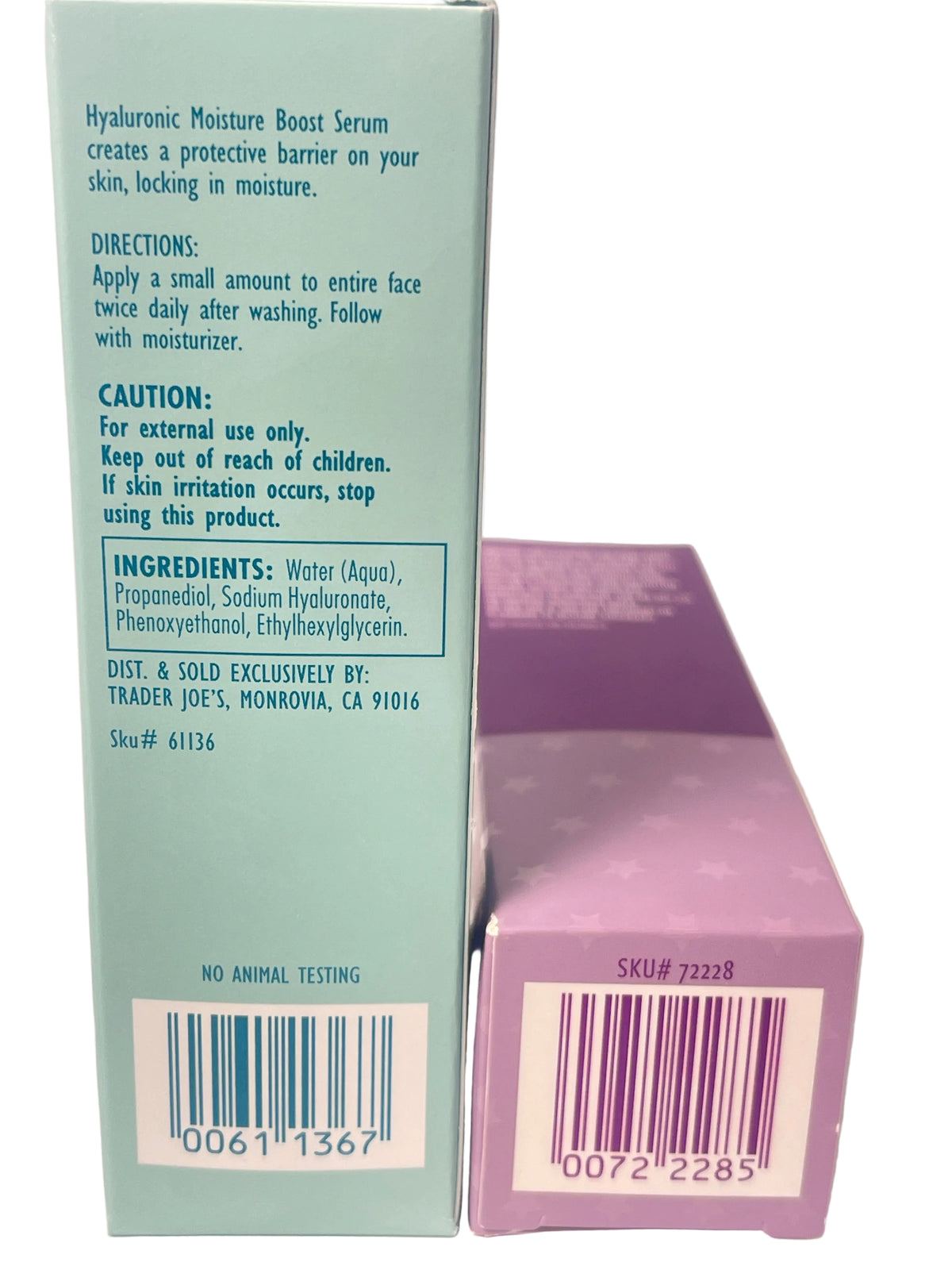 Back of a skincare product box in light aqua blue showing product text, alongside a lavender-purple product box with a barcode and SKU label.