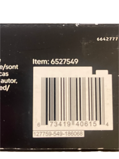 Close-up of a black product box showing a white barcode, item number 6527549, and partial text on a white background.