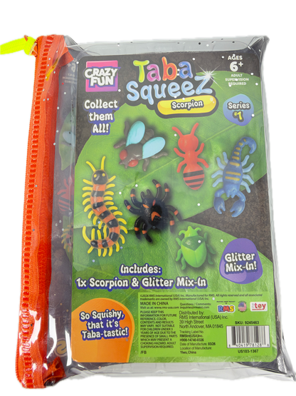 A packaged toy set in a clear zip pouch labeled 'Taba Squeezz' with insect-themed glitter mix-ins, including a scorpion and spider, shown against a plain white background.