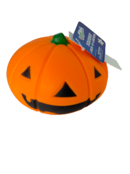 An orange Squishypumpkin-shaped ball toy with black jack-o'-lantern facial features, a small green stem, and a blue product tag attached, shown on a plain white background.