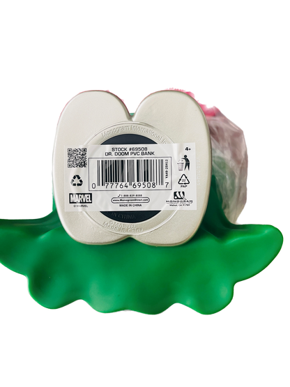 Green plastic item with a label on a white background
