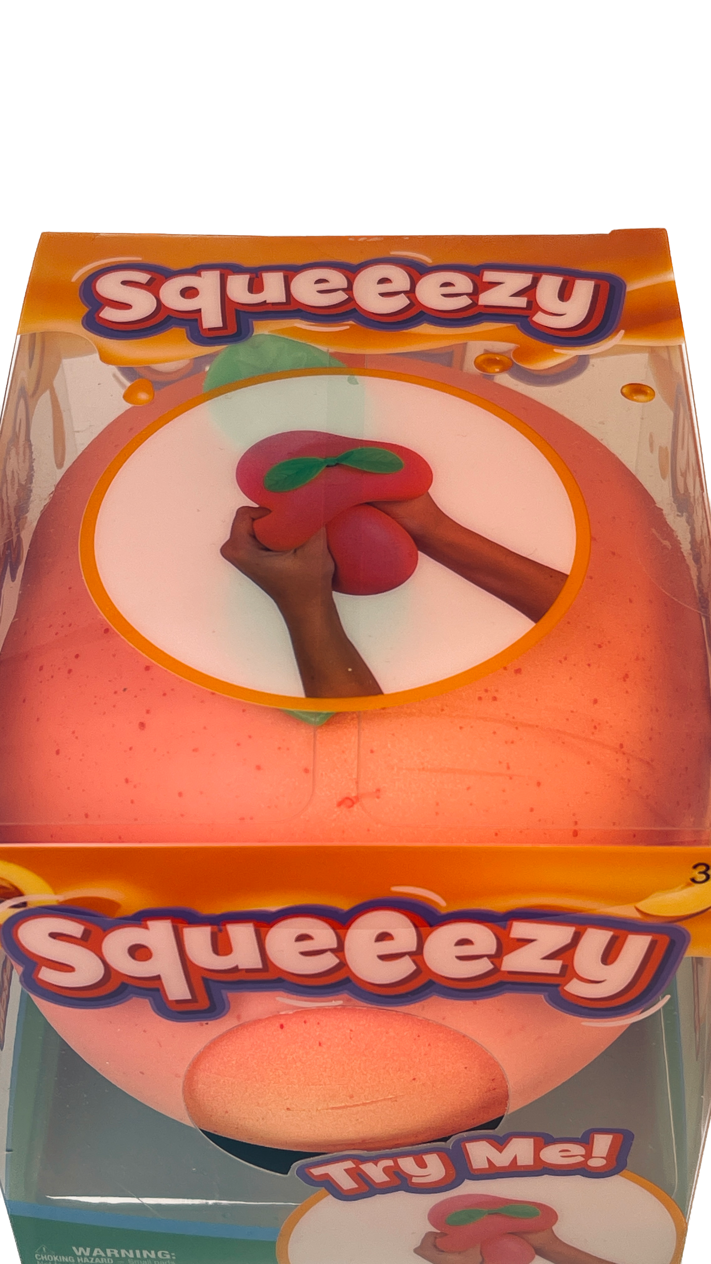 Box of a 'Squeezy' toy with an illustration of a hand squeezing a red object.