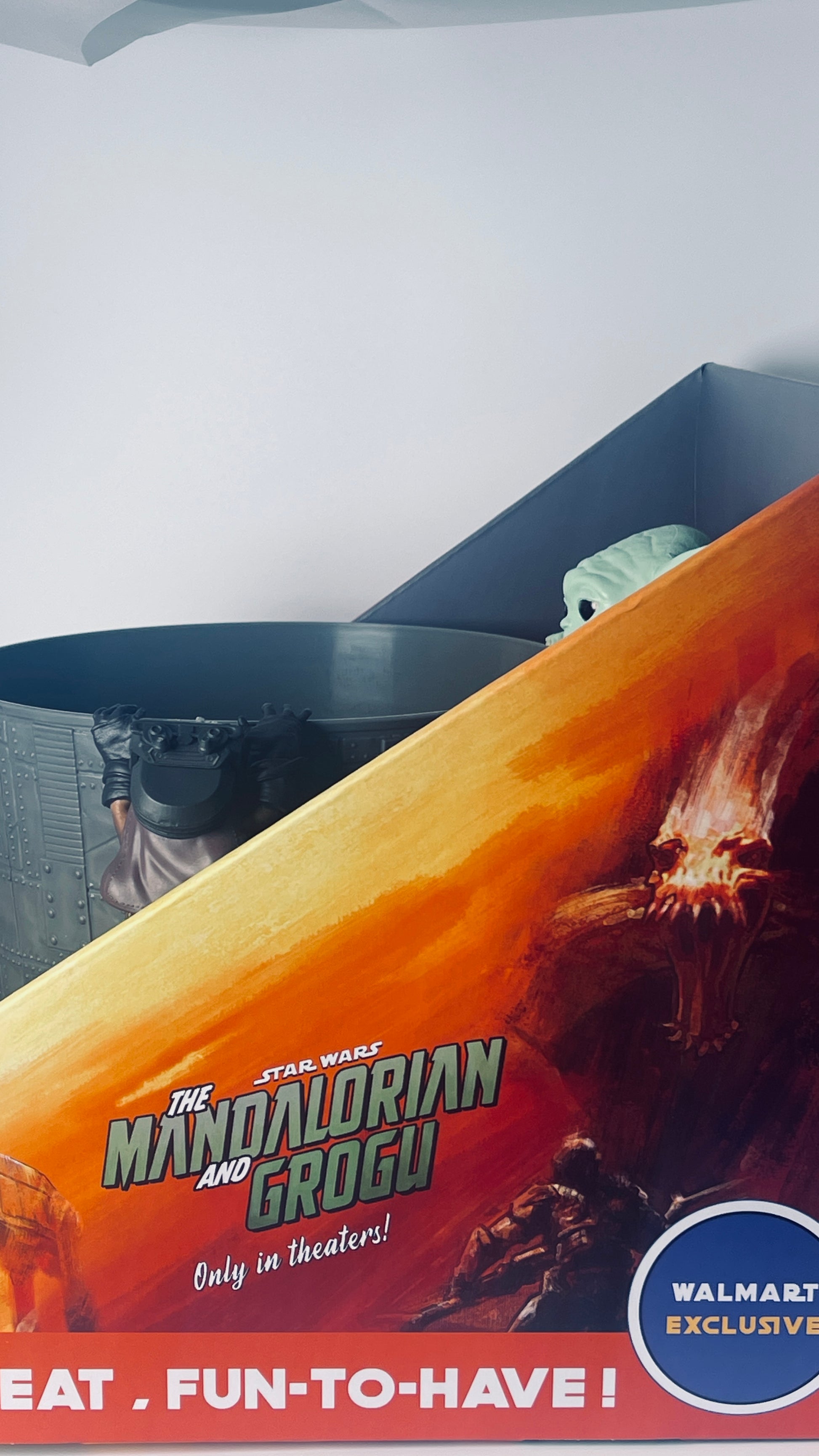 Promotional poster for 'The Mandalorian and Grogu' with a Walmart exclusive logo.