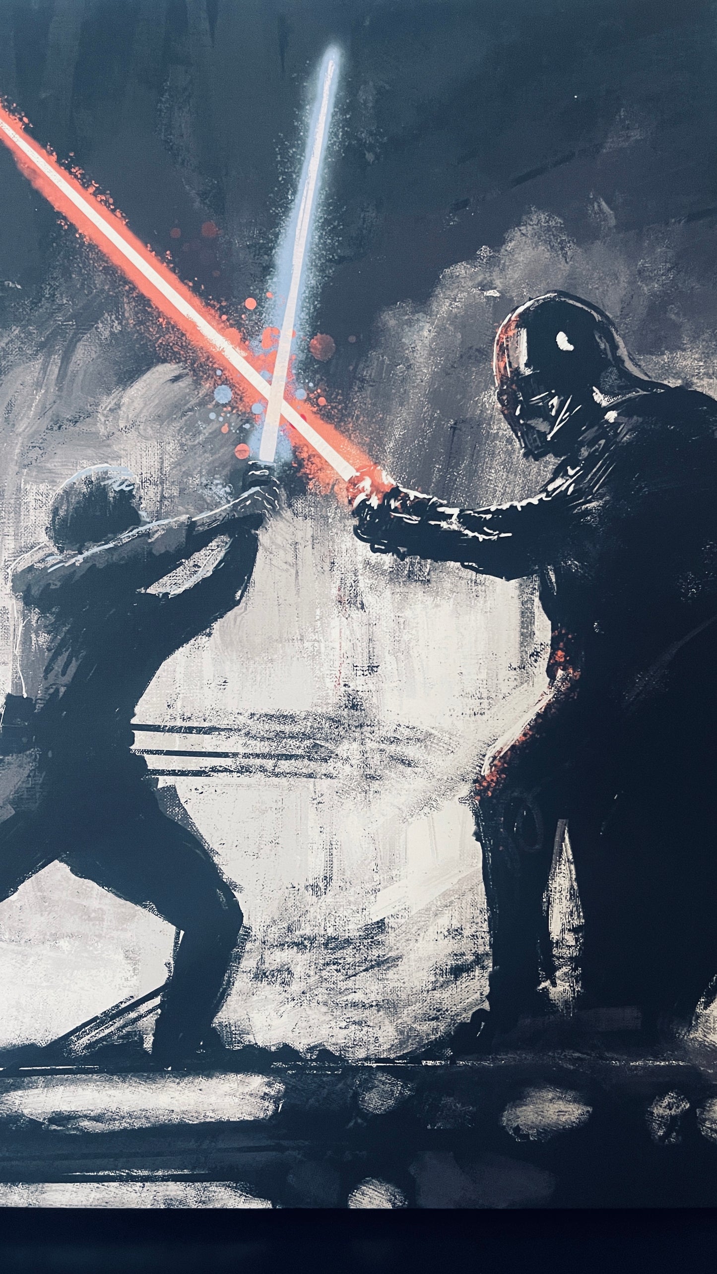 Two figures engaged in a lightsaber duel with one wielding a red lightsaber.