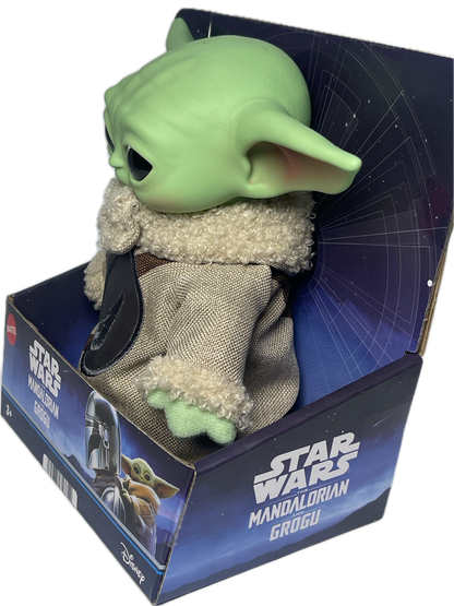 Green alien toy in a 'Star Wars' branded box