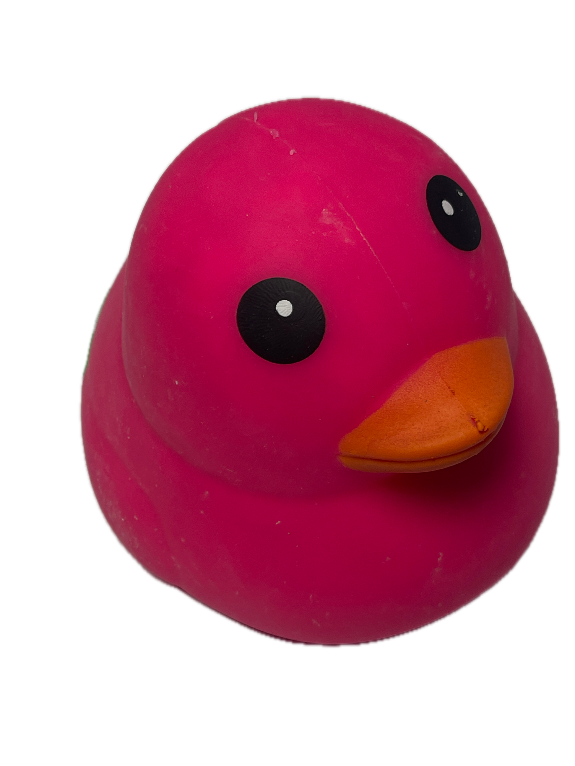 Pink object with black circles and an orange triangle on a white background