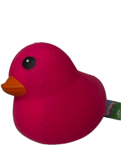 Pink bird-shaped object with a black eye and orange beak on a white background