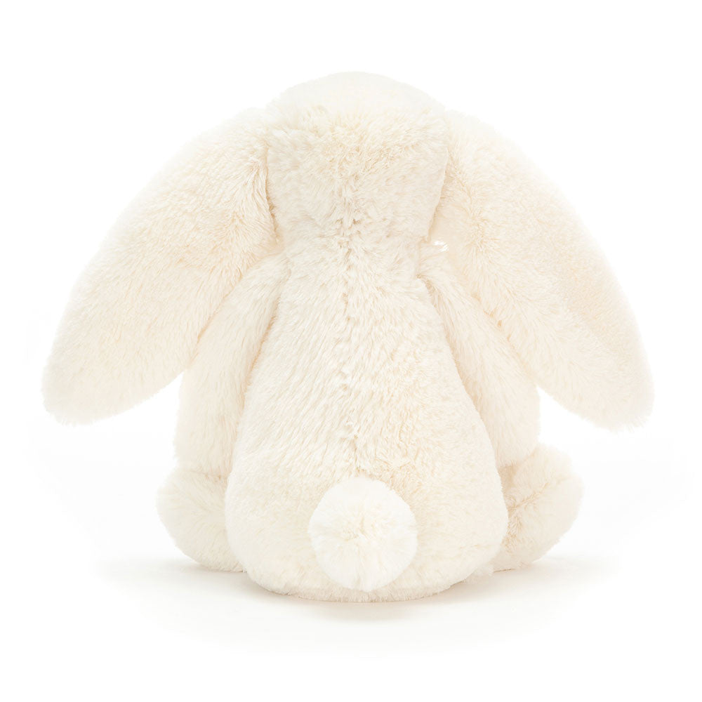 White plush bunny toy on a white background