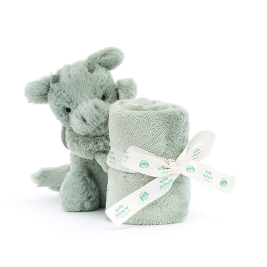Green plush elephant toy with matching blanket on a white background