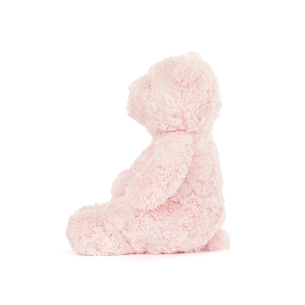 Pink plush toy on a white background