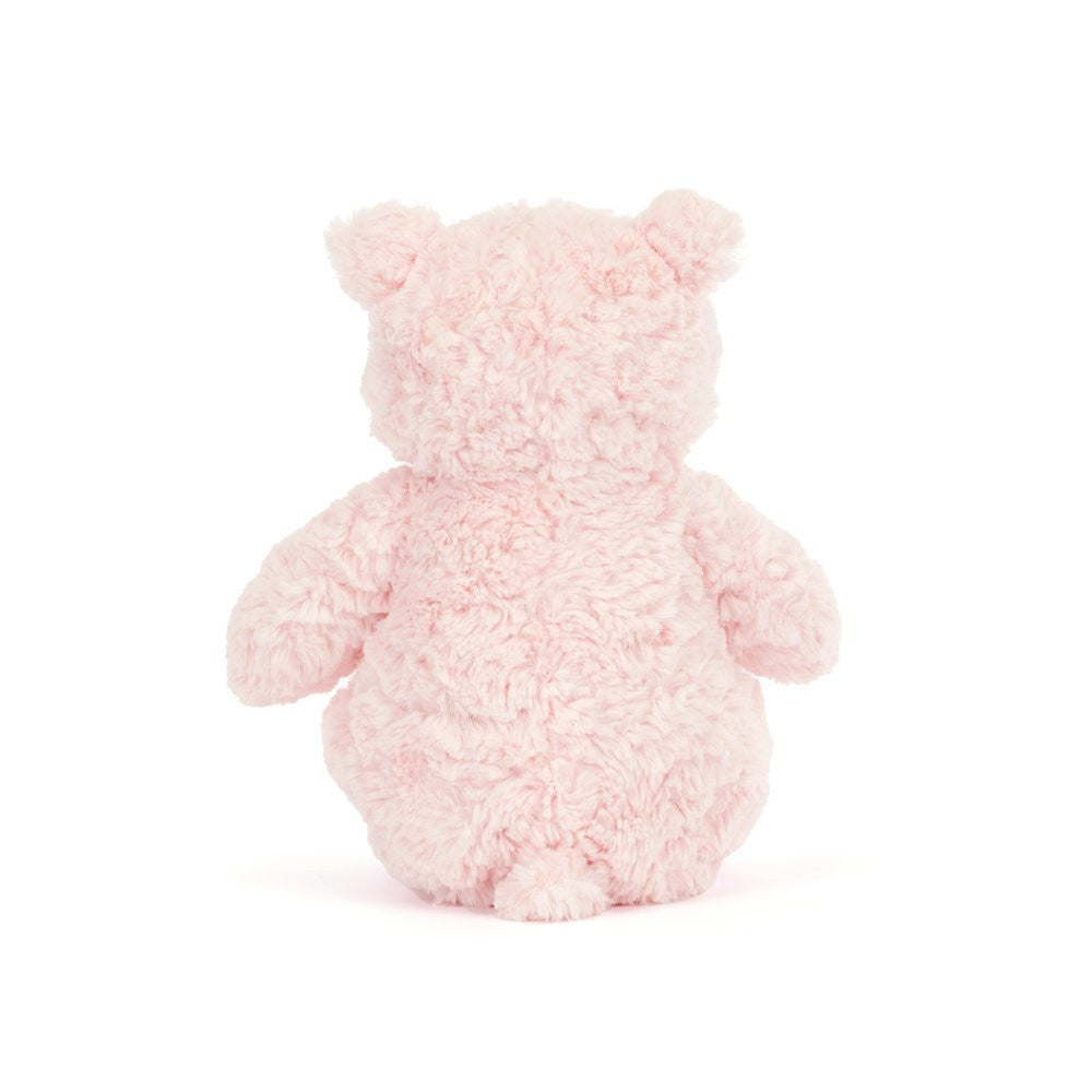 Pink teddy bear on a white background