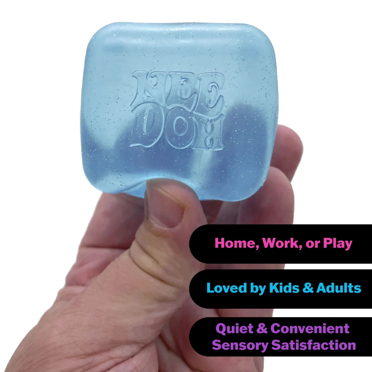 Blue square object with branding held in a hand against a white background