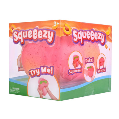Box of Squeeezy toy with pink character on a white background