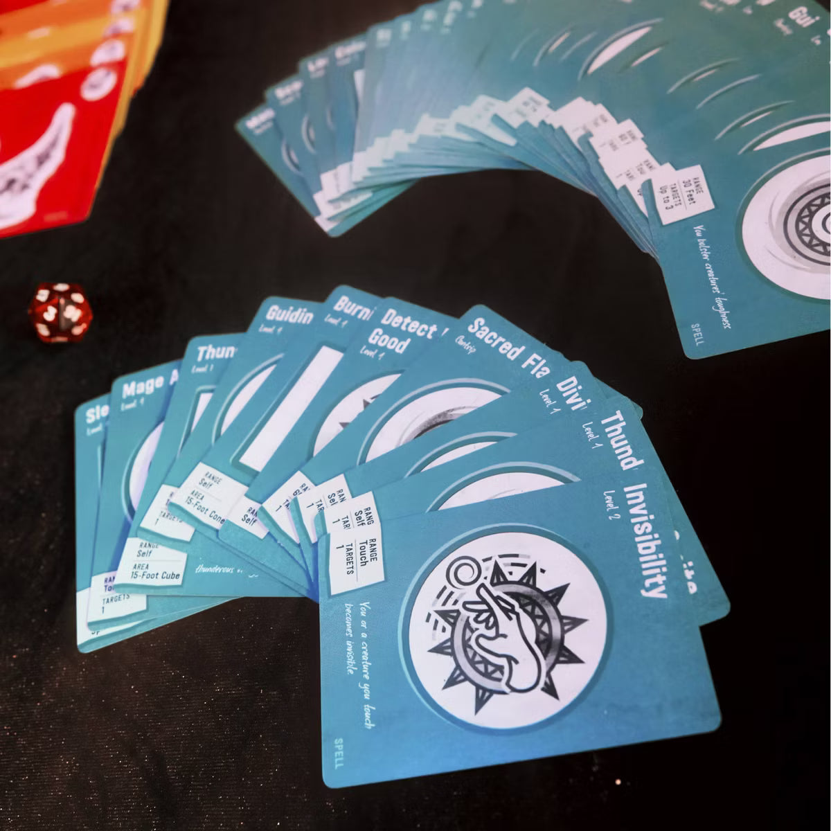 Collection of blue cards with text and symbols on a dark surface