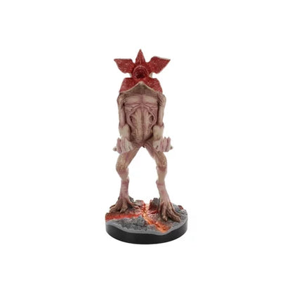Fantasy creature figurine with red helmet on a white background