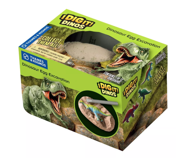 Dinosaur egg excavation toy set packaging with 'I Dig It! Dinos' branding.