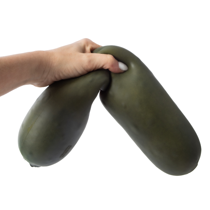 Hand holding two green eggplants against a white background