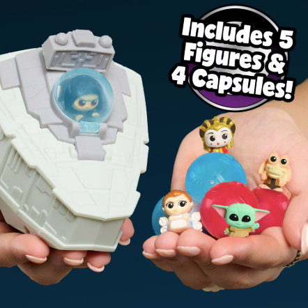 Toy set with figures and capsules, including text 'Includes 5 Figures & 4 Capsules!'.