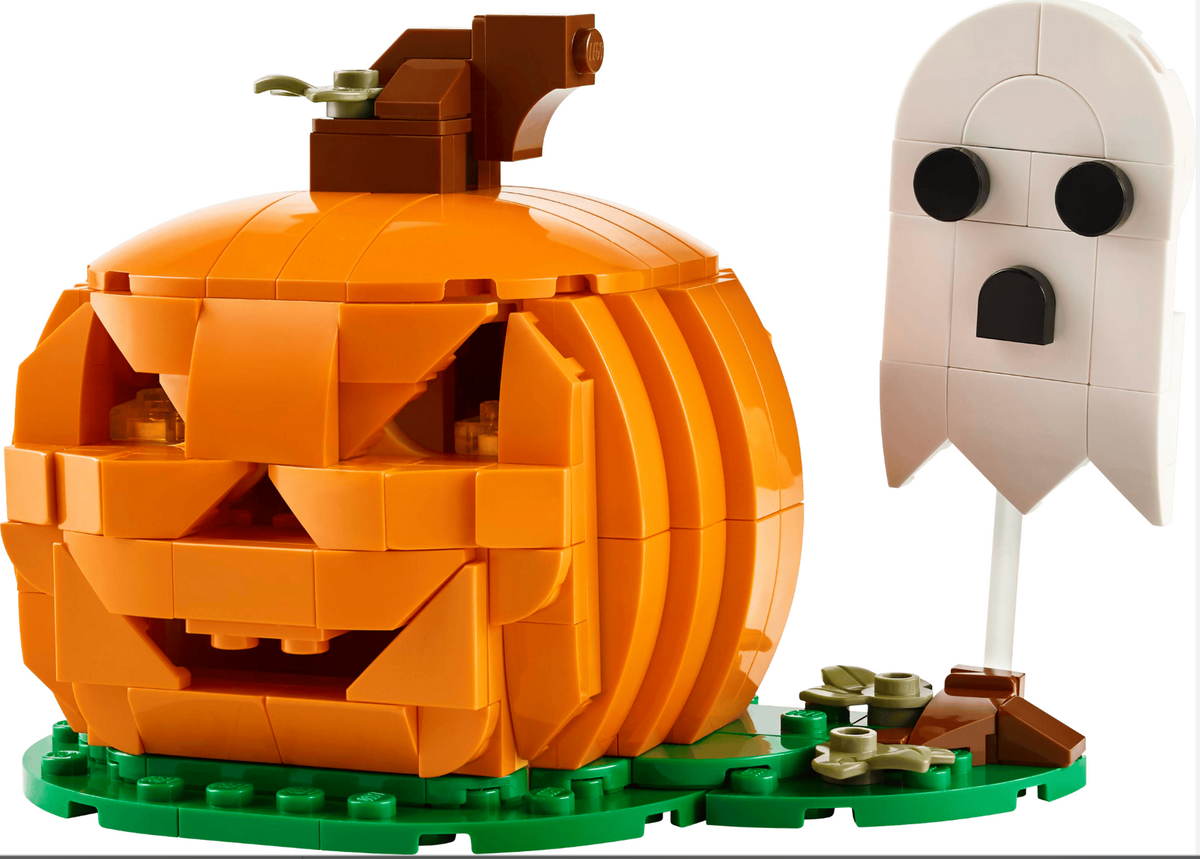 A LEGO Halloween-themed set featuring a carved orange jack-o'-lantern pumpkin on a green base, next to a white ghost figure with black eyes and mouth on a stick, against a plain white background.