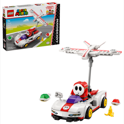 LEGO Super Mario set 75192 Mario's Race Car with Helipad, showing the assembled toy car with a small airplane on a stand, plus the retail box on a clean white background.