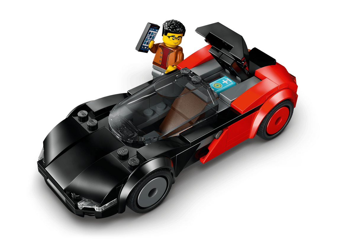 LEGO City sports car set with a black and red open-top race car, a small LEGO minifigure, and a phone accessory on a clean white background.