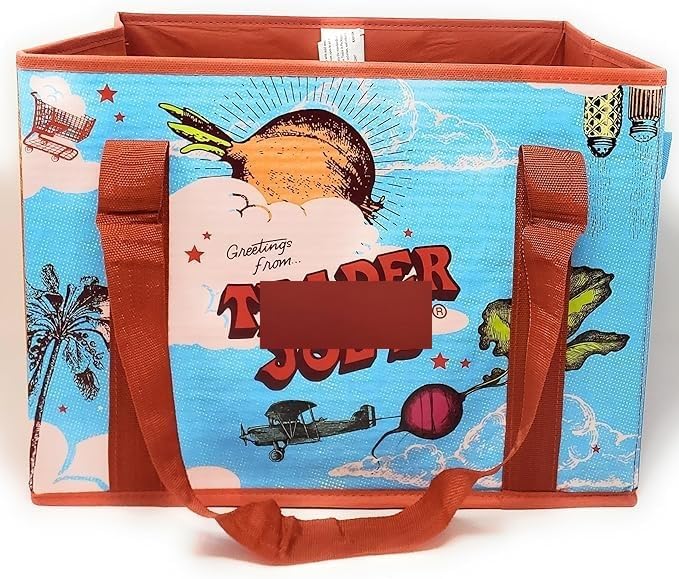 Cartoon-style tote bag with 'Greetings from Toadder' text and vintage airplane design on a blue background.