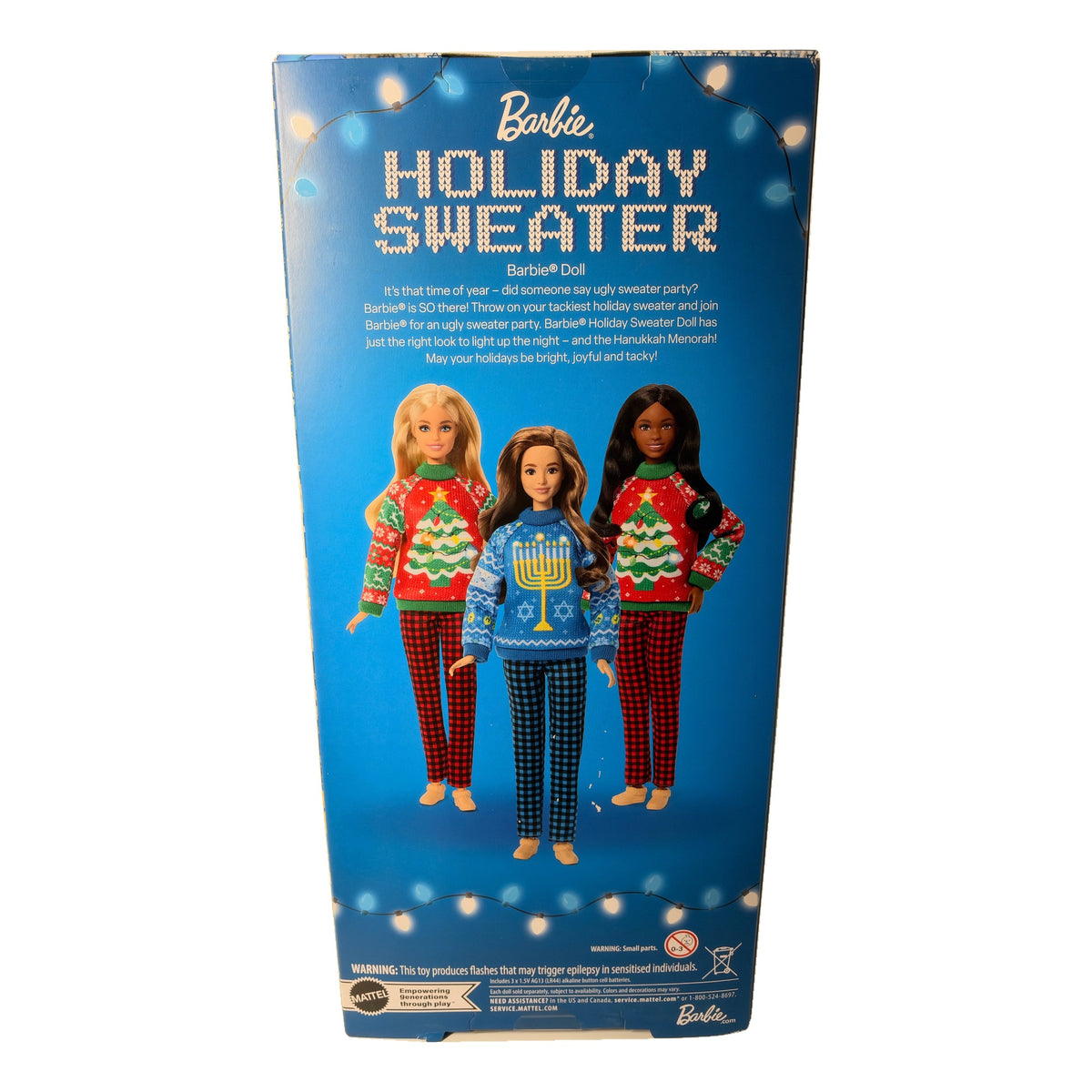 Back of Barbie Holiday Sweater doll box showing the three 2026 holiday sweater dolls