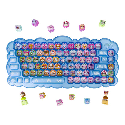 A colorful keyboard-shaped accessory with a cloud-like outline, filled with many small character keycaps and surrounded by loose matching character pieces on a plain white background.