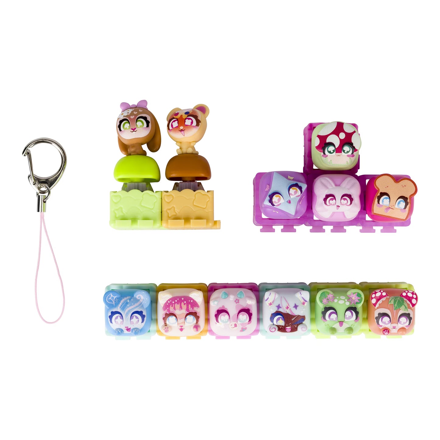 A set of small colorful toy character blocks with cartoon faces, shown with a silver carabiner and pink lanyard on a plain white background.