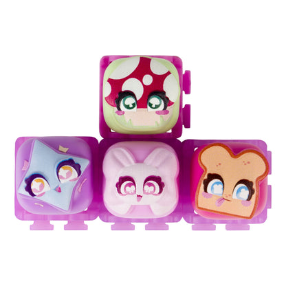 Four cute, cartoon-style squishy foam accessories arranged in a pyramid on a solid white background. The set includes a mushroom cap, a bunny face, a slice of toast, and a blue star, all in matching translucent pink plastic cases.