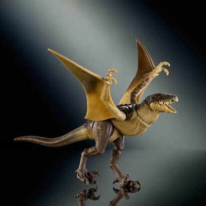 A detailed action figure of a prehistoric flying dinosaur, resembling a Pteranodon, with wings spread, set against a dark studio background with a spotlight effect.