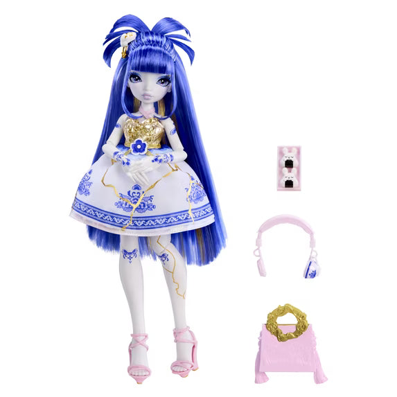 A doll with long blue hair wearing a white and blue dress, shown with small accessory items including a pink headband, a pink bag, and a small pink box on a plain white background.