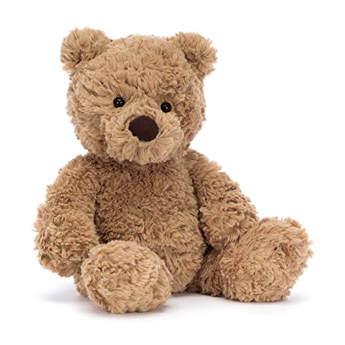 Plush teddy bear on a white background