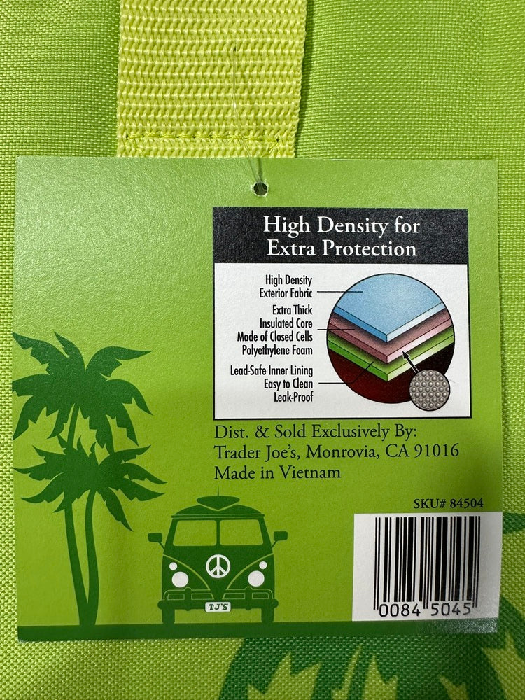 A close-up of a green fabric product with a lime green woven strap and a printed hang tag showing palm tree graphics, a vehicle icon, and a fabric cross-section diagram.