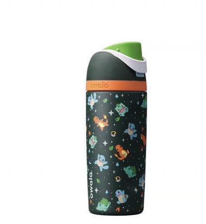 A Owala insulated water bottle with a dark green space-themed pattern featuring cartoon characters and stars, topped with a green and white lid and an orange band.