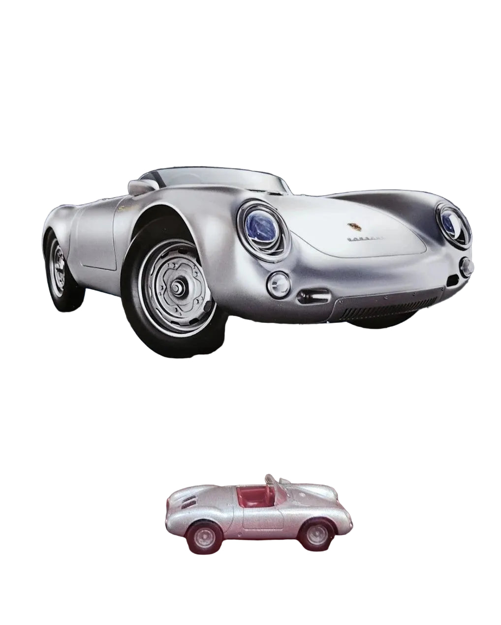 A Majorette die-cast model car of a 1955 Porsche 550 Spyder, shown in its original blister pack packaging on a wooden surface.